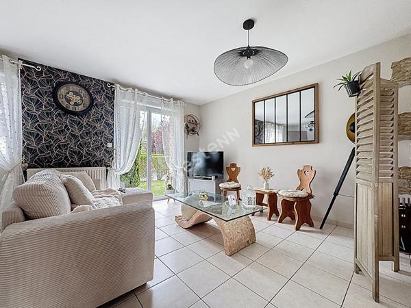 Maison familiale à vendre à Ancenis - 4 chambres, jardin et garage.