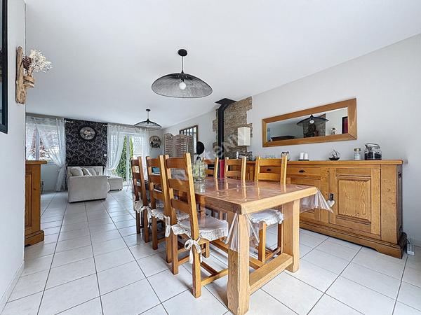 Maison familiale à vendre à Ancenis - 4 chambres, jardin et garage.