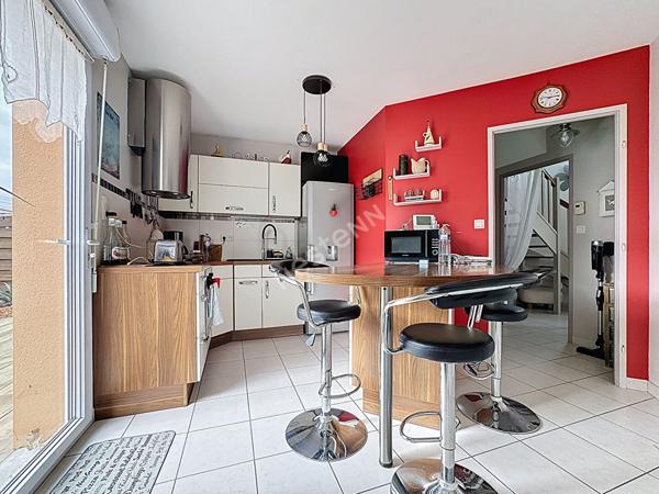 Maison familiale à vendre à Ancenis - 4 chambres, jardin et garage.