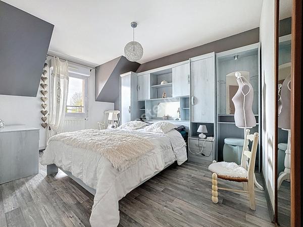 Maison familiale à vendre à Ancenis - 4 chambres, jardin et garage.