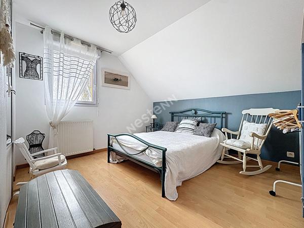 Maison familiale à vendre à Ancenis - 4 chambres, jardin et garage.