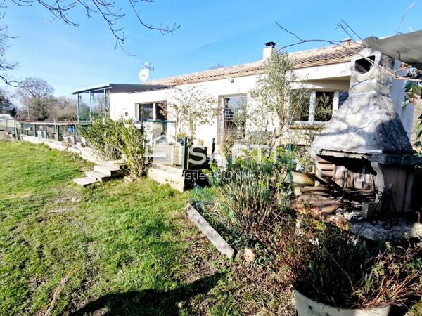 Maiosn d'habitation avec étang