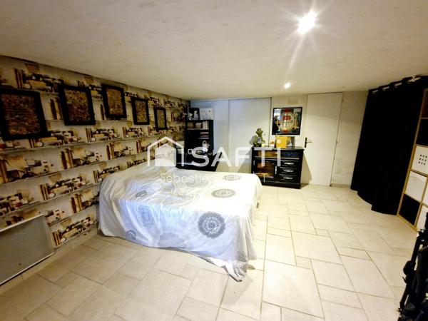 Maiosn d'habitation avec étang