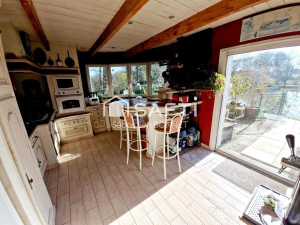 Maiosn d'habitation avec étang