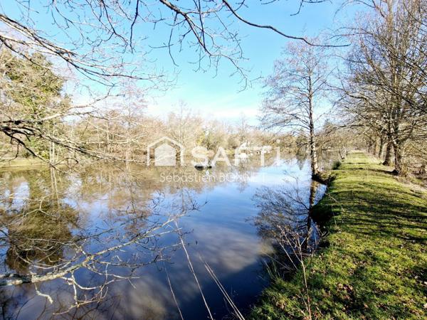 Maiosn d'habitation avec étang