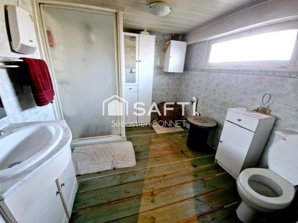 Maiosn d'habitation avec étang