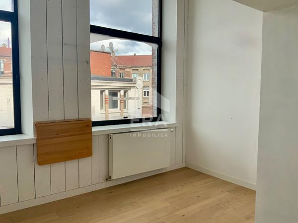 Grand loft 160 m² avec 3 places de parking à Lille