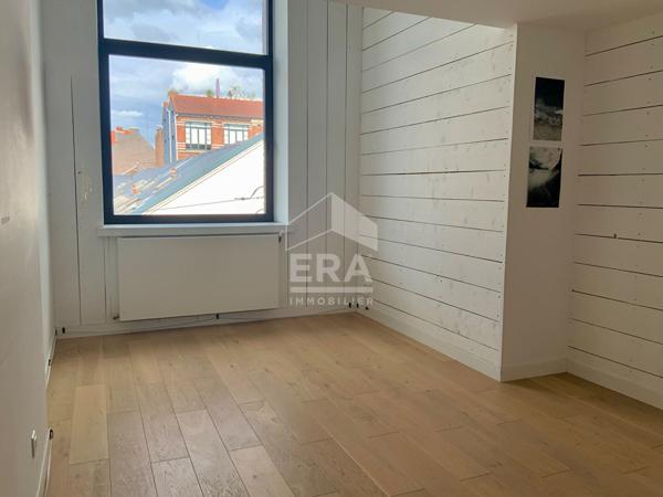 Grand loft 160 m² avec 3 places de parking à Lille