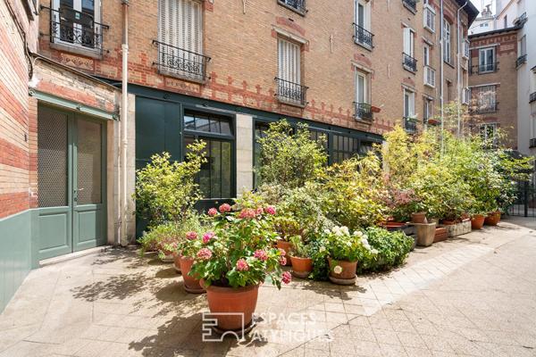 Loft aux accents industriels au calme d’une cour proche Nation