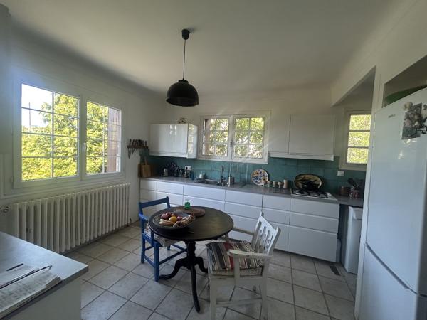 Maison de 4 chambres, avec sous-sol et garage