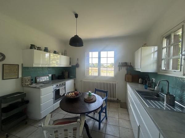 Maison de 4 chambres, avec sous-sol et garage