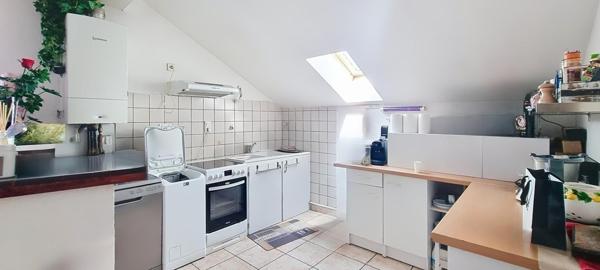 Maison avec trois appartements, garage et jardin