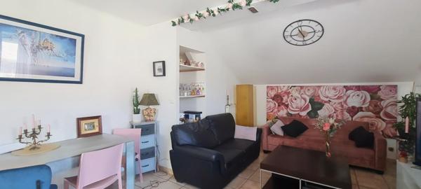 Maison avec trois appartements, garage et jardin