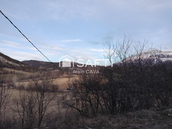 Appartement de 122m² avec mezzanine terrasse et parking dans une maison divisée en 2 logments