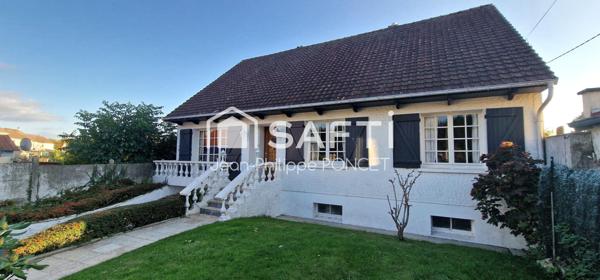 Maison plain pied sur sous-sol avec jardin