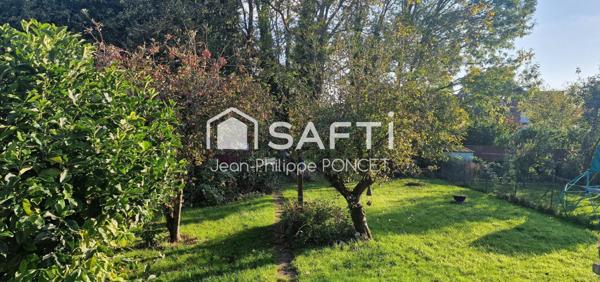 Maison plain pied sur sous-sol avec jardin