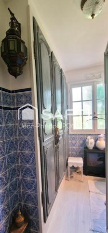 Maison plain pied sur sous-sol avec jardin