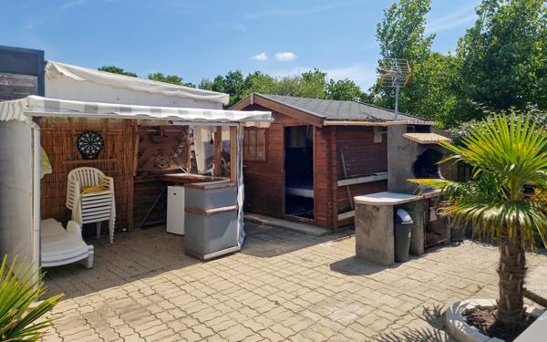 Bourgneuf-en-Retz (44580) Terrain de loisirs 221 m² avec Cottage - avec terrasse, dépendances et garage - jardin