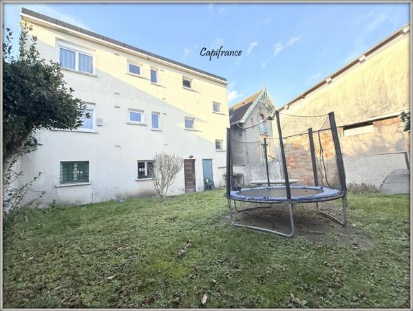 DRANCY - IMMEUBLE 2 APPARTEMENTS F3 + GARAGES + JARDIN