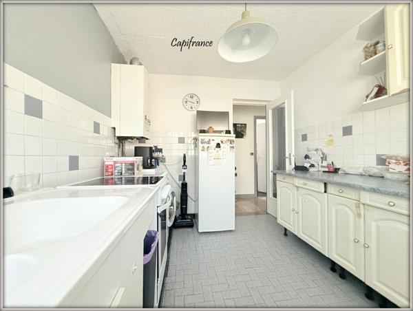 DRANCY - IMMEUBLE 2 APPARTEMENTS F3 + GARAGES + JARDIN