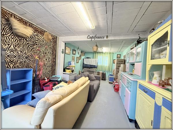 DRANCY - IMMEUBLE 2 APPARTEMENTS F3 + GARAGES + JARDIN