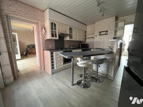 DIVION - Maison mitoyenne de 1920 - 3 chambres - 119m² habitable