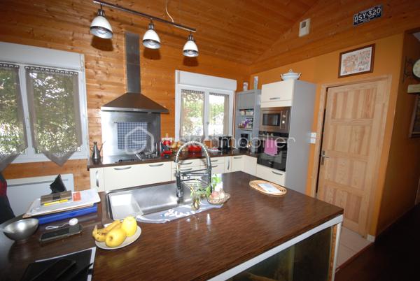 PORT DE LANNE  Très belle maison a ossature bois de grand standing de 75 m² sur terrain boisé de 850m²  , dans un quartier très calme  , A VISITER SOUS SEREZ SOUS LE CHARME  , grand séjour  ,cuisine équipée  , suite parentale , SDB, WC,     PRIX TRES INTERESSANT      visite    Jean Jacques LANDES  BSK IMMOBILIER