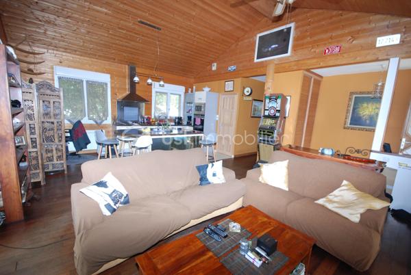 PORT DE LANNE  Très belle maison a ossature bois de grand standing de 75 m² sur terrain boisé de 850m²  , dans un quartier très calme  , A VISITER SOUS SEREZ SOUS LE CHARME  , grand séjour  ,cuisine équipée  , suite parentale , SDB, WC,     PRIX TRES INTERESSANT      visite    Jean Jacques LANDES  BSK IMMOBILIER