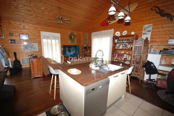 PORT DE LANNE  Très belle maison a ossature bois de grand standing de 75 m² sur terrain boisé de 850m²  , dans un quartier très calme  , A VISITER SOUS SEREZ SOUS LE CHARME  , grand séjour  ,cuisine équipée  , suite parentale , SDB, WC,     PRIX TRES INTERESSANT      visite    Jean Jacques LANDES  BSK IMMOBILIER