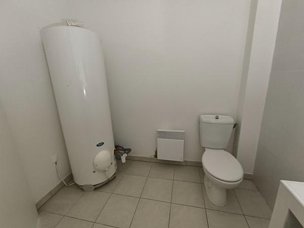 Immeuble composé de 2 appartements mitoyennes libres de 31 m² avec jardinet à Libourne