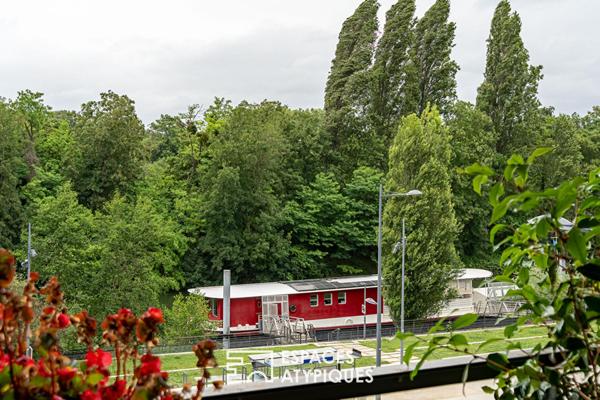 Appartement avec multiples terrasses face à la Seine et l’île Saint-Germain