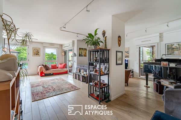 Appartement avec multiples terrasses face à la Seine et l’île Saint-Germain