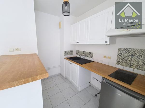 Appartement Type 1, 28m2, terrasse et place de stationnement privative