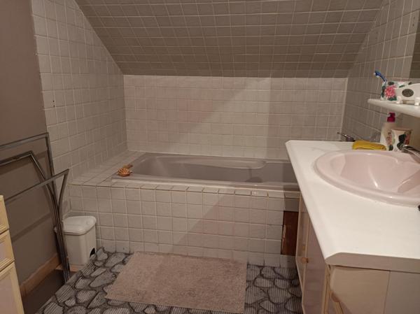 Maison avec rez commercial + fonds