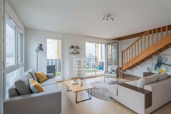 Duplex Village Olympique de 93m²  dernier étage