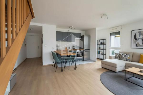 Duplex Village Olympique de 93m²  dernier étage