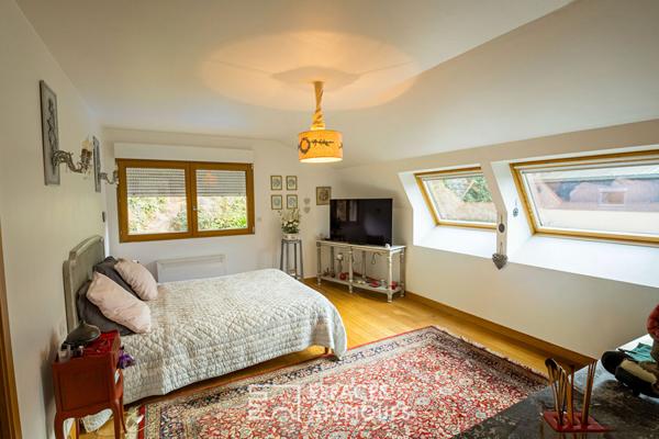 Maison en pierre avec un gîte