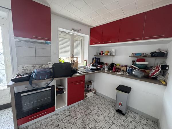 Maison mitoyenne d'environ 80 m2 beau potentiel d'évolution !