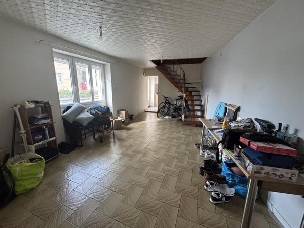Maison mitoyenne d'environ 80 m2 beau potentiel d'évolution !