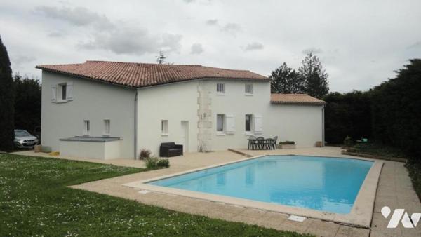 Propriété 5 chambres - garages - jardin