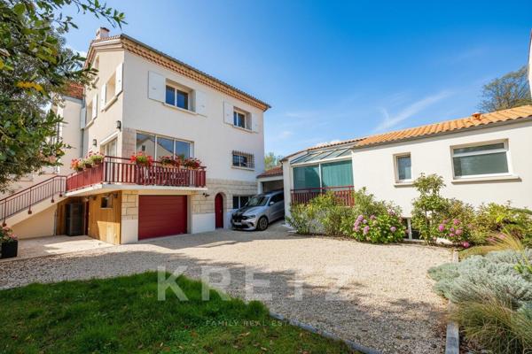 Maison polyvalente : 4 chambres, jardin, espace pro et sous-sol aménagé