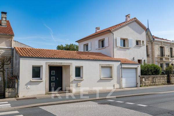 Maison polyvalente : 4 chambres, jardin, espace pro et sous-sol aménagé