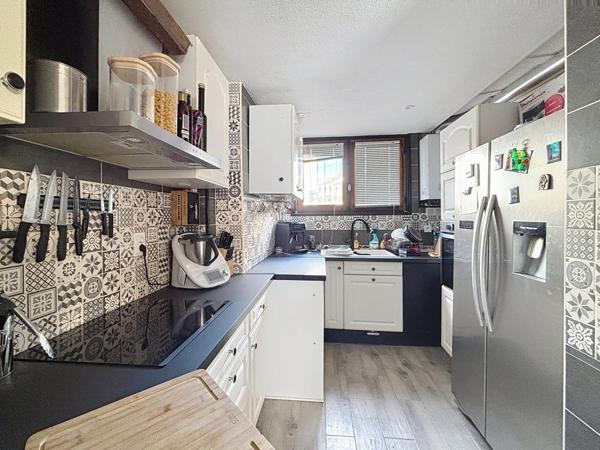 Appartement 78m2 avec grande terrasse, garage et cave