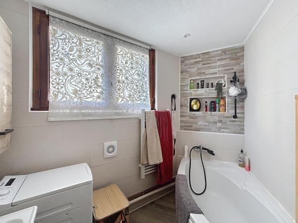 Appartement 78m2 avec grande terrasse, garage et cave