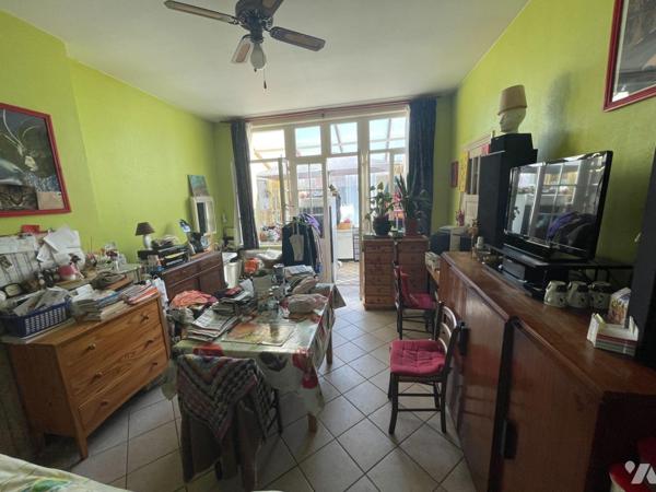 Idéal pour investisseur : En plein Coeur de ville. Immeuble composé de 7 chambres et 2 T1.  ven...