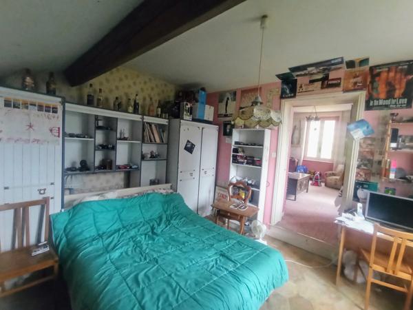 Maison de caractère sur terrain arboré constructible