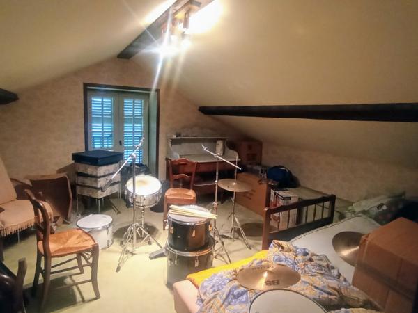 Maison de caractère sur terrain arboré constructible