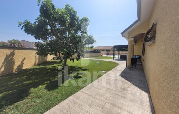 Maison de plain-pied avec piscine T5 117m2