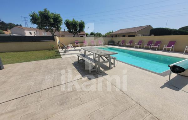 Maison de plain-pied avec piscine T5 117m2