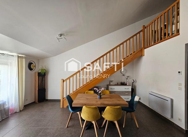 Appartement en duplex rénové de 3 chambres avec balcon et jardinet